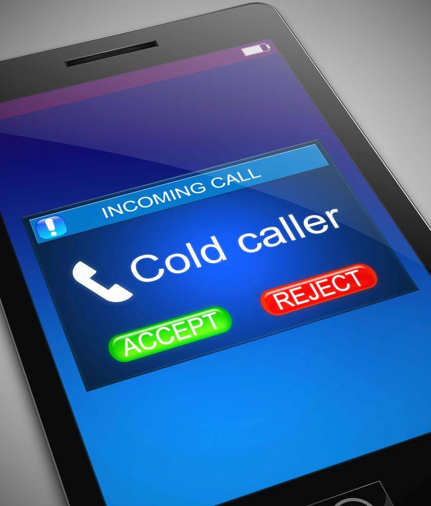 Smartphone screen shows incoming call from a cold caller, highlighting the ineffectiveness of cold-calling as a marketing tactic.