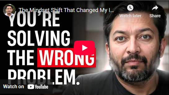Man with a beard beside bold text: "You're Solving the Wrong Problem," promoting a YouTube video on mindset shifts.
