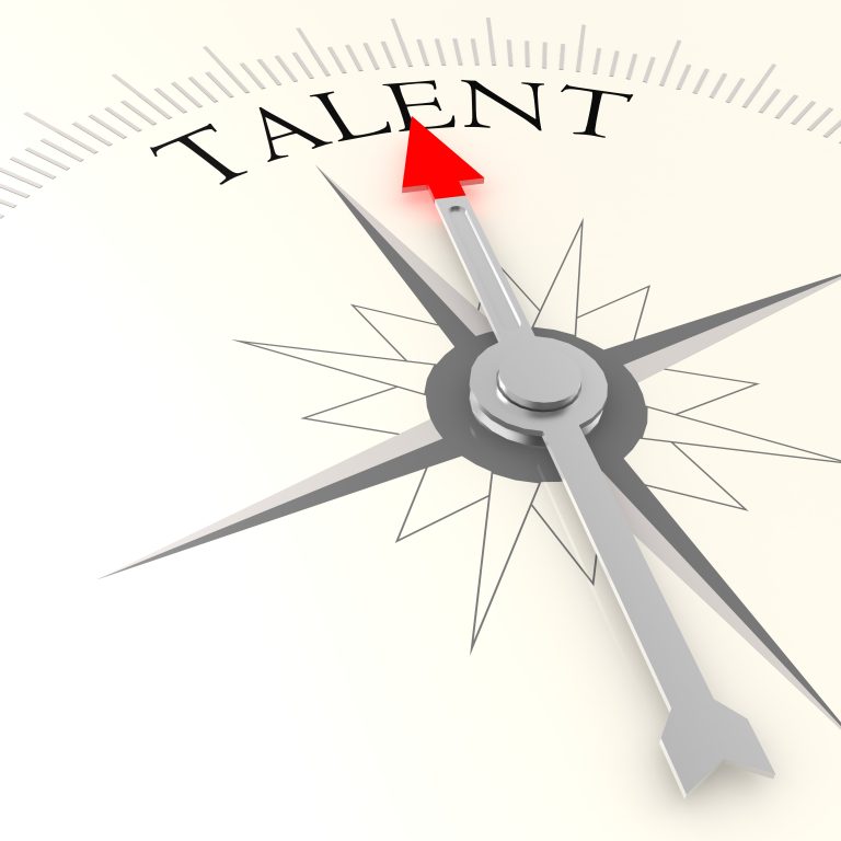 Compass needle pointing to "Talent," symbolizing talent management direction.