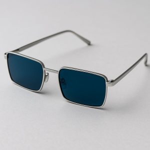 Rectangular Enneagram Lens type 5 sunglasses with dark blue lenses and a sleek metal frame.
