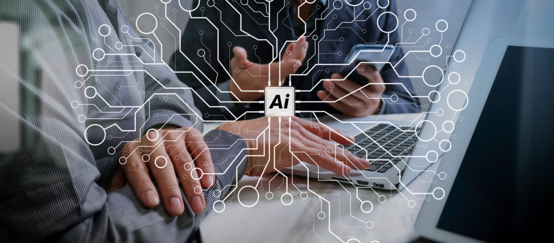 Two people discuss AI tools for businesses while using a laptop and smartphone, with digital circuit graphics overlaying the image.