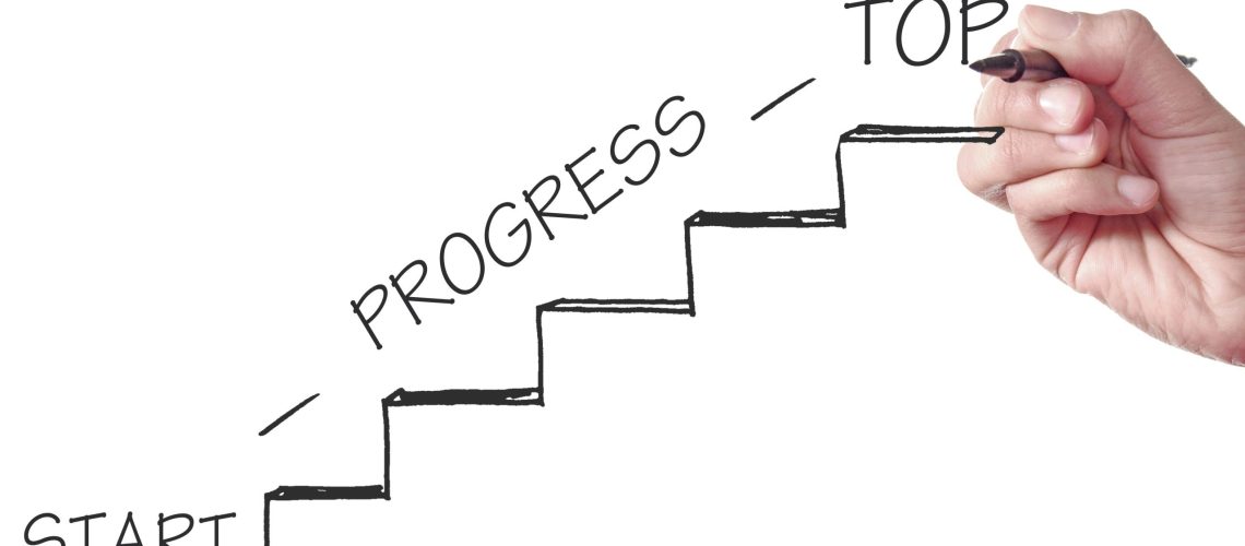 Hand drawing stairs labeled Start, Progress, Top, illustrating career coaching vs career counselling pathways.