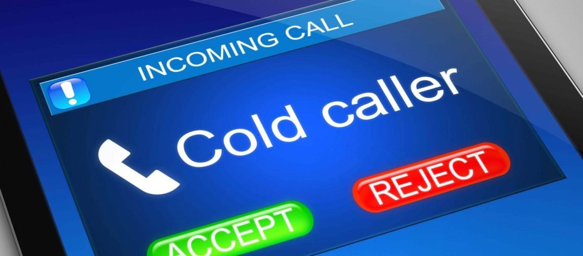 Smartphone screen shows incoming call from a cold caller, highlighting the ineffectiveness of cold-calling as a marketing tactic.