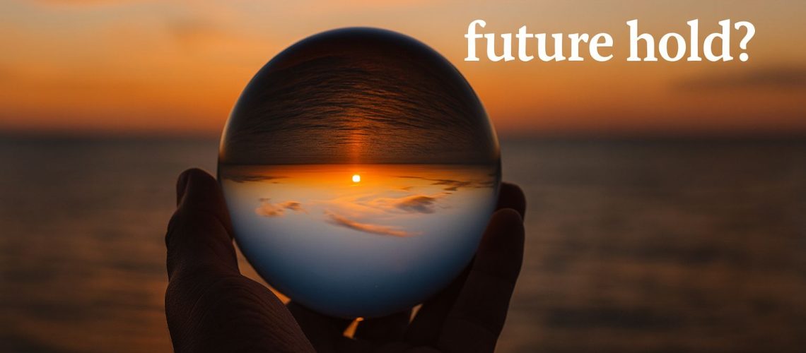 A hand holds a crystal ball reflecting a sunset over the ocean, with the text "What does the future hold?" in the background.